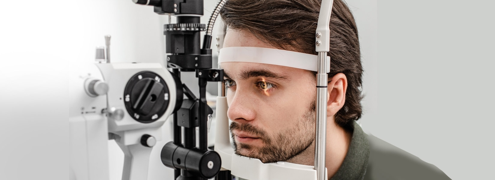 young man during eye exam in Southborough